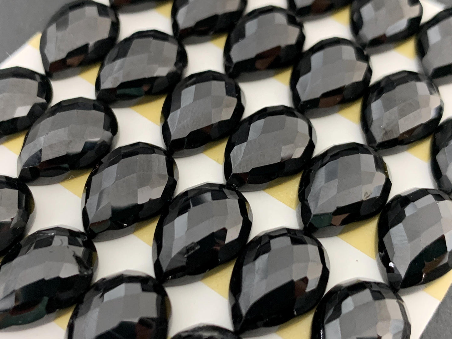 Faceted Black Spinel pear 10x14mm cabochon