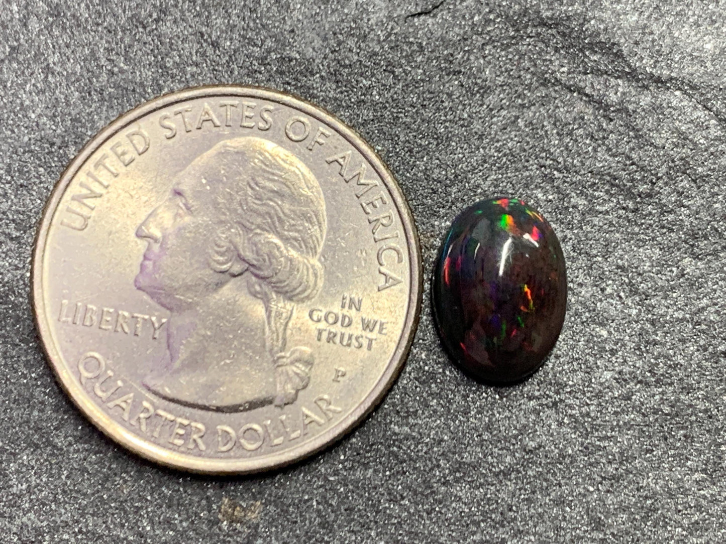 Black Ethiopian Opal oval 8x11x45mm cabochon