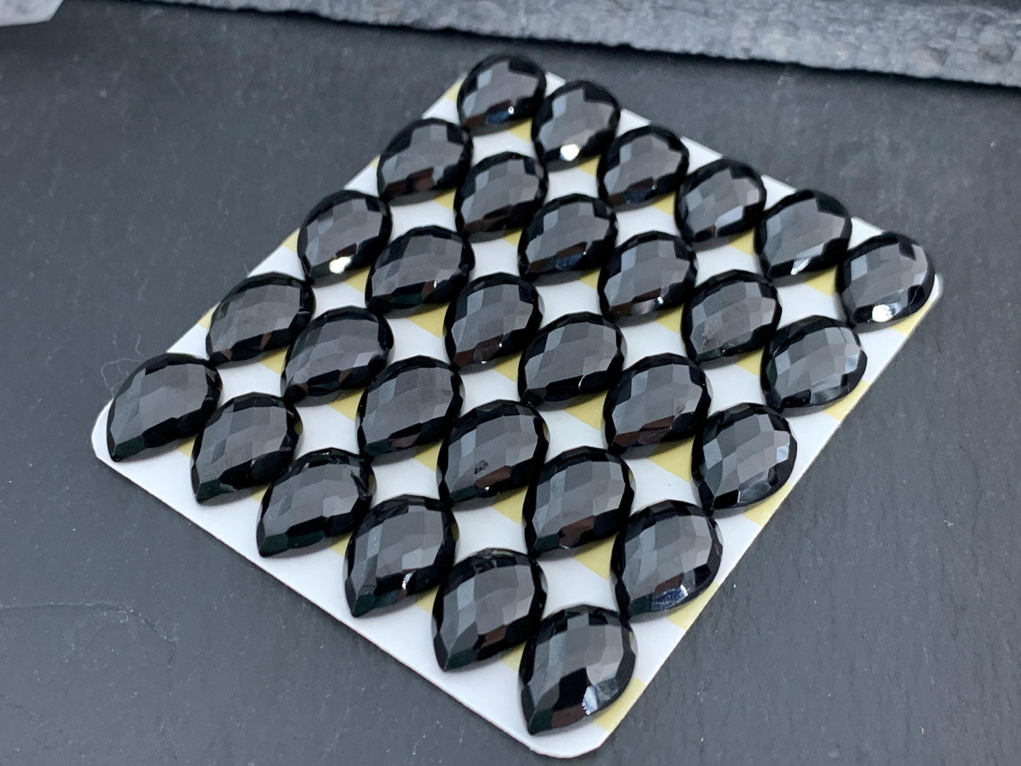 Faceted Black Spinel pear 10x14mm cabochon