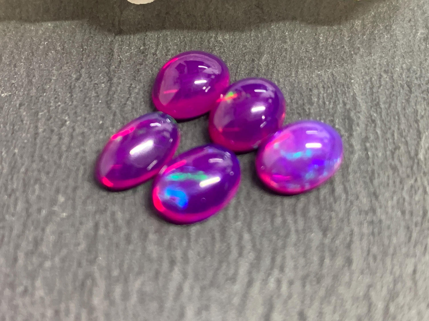 Ethiopian Opal oval 9-10mm long cabochon - Natural Opal smoked to purple color