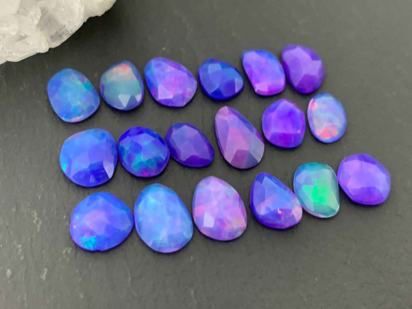 Faceted Purple Ethiopian Opal 7-8mm cabochon