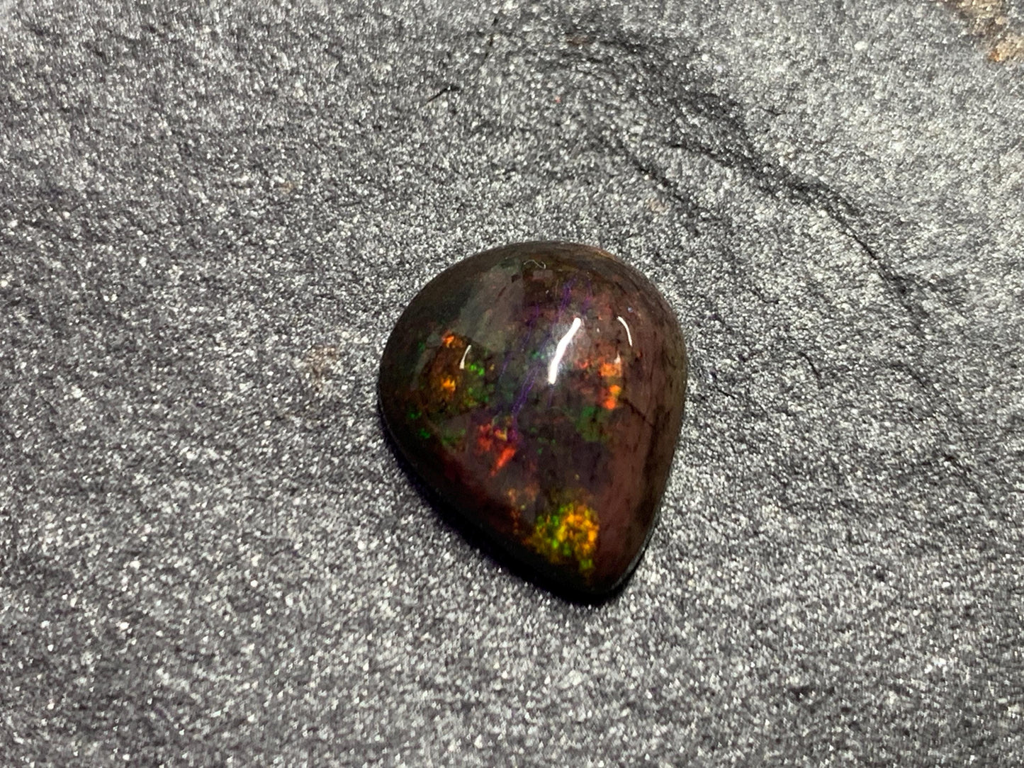 Black Ethiopian Opal pear 10x12x4mm cabochon