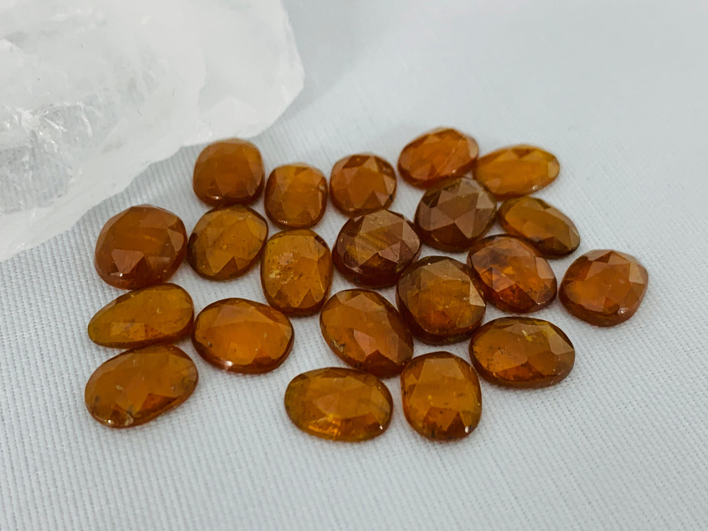 Faceted orange Kyanite oval 7x12mm cabochons