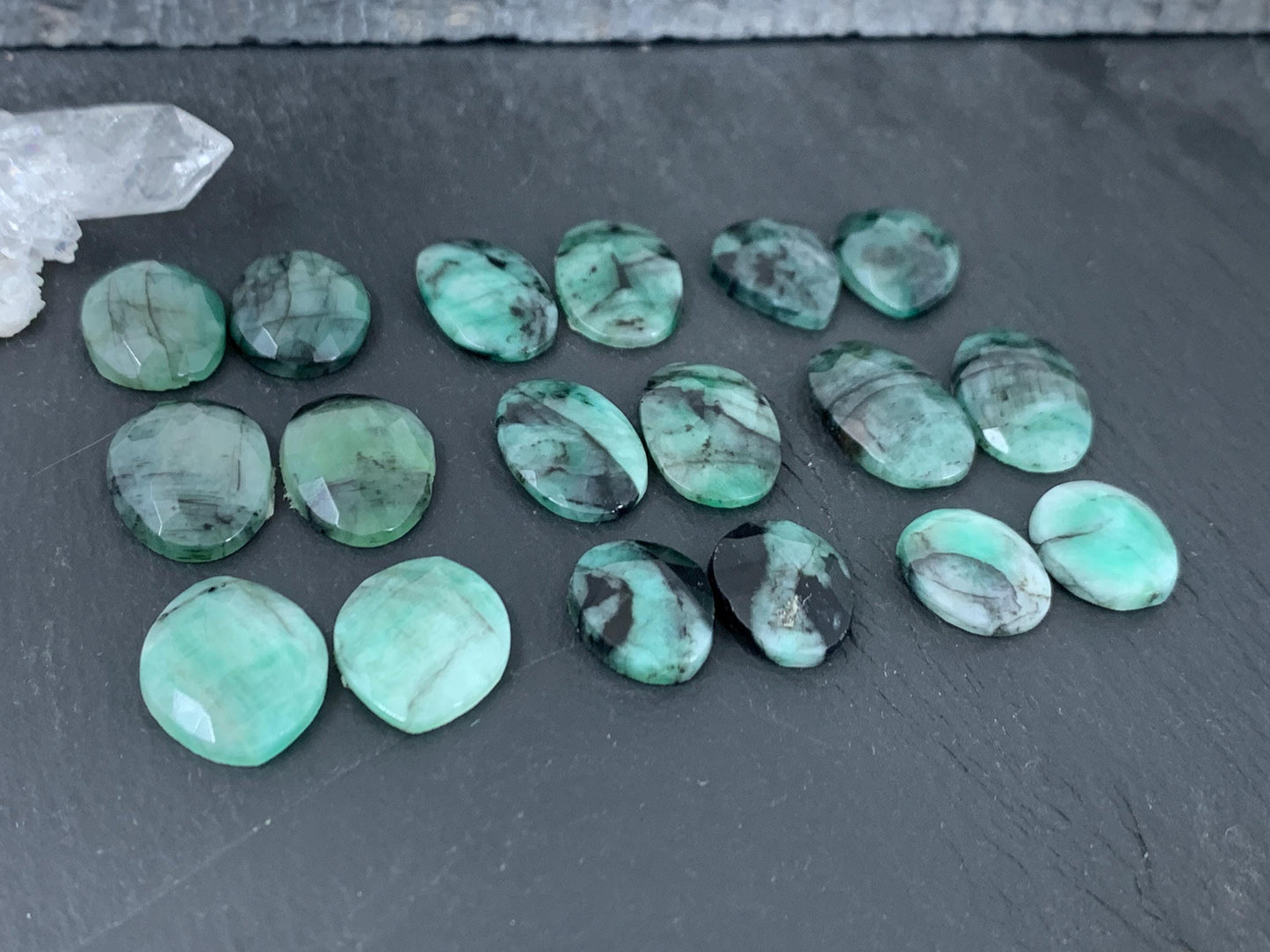 Faceted Emerald pair 14-18mm long cabochon