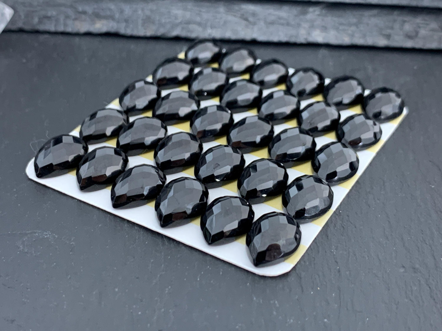 Faceted Black Spinel pear 10x14mm cabochon