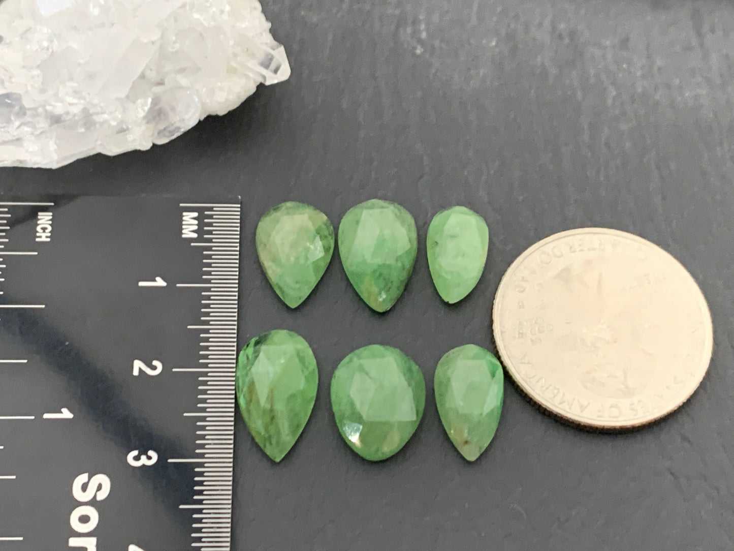 Faceted Tsavorite pear 12-14mm long cabochon
