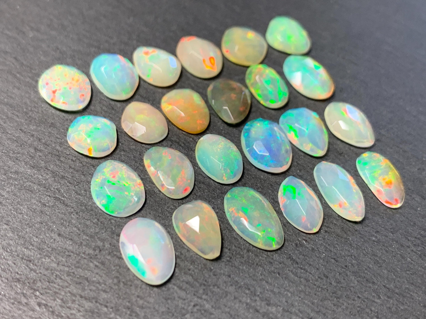 Faceted Ethiopian Opal 9-10mm long cabochon