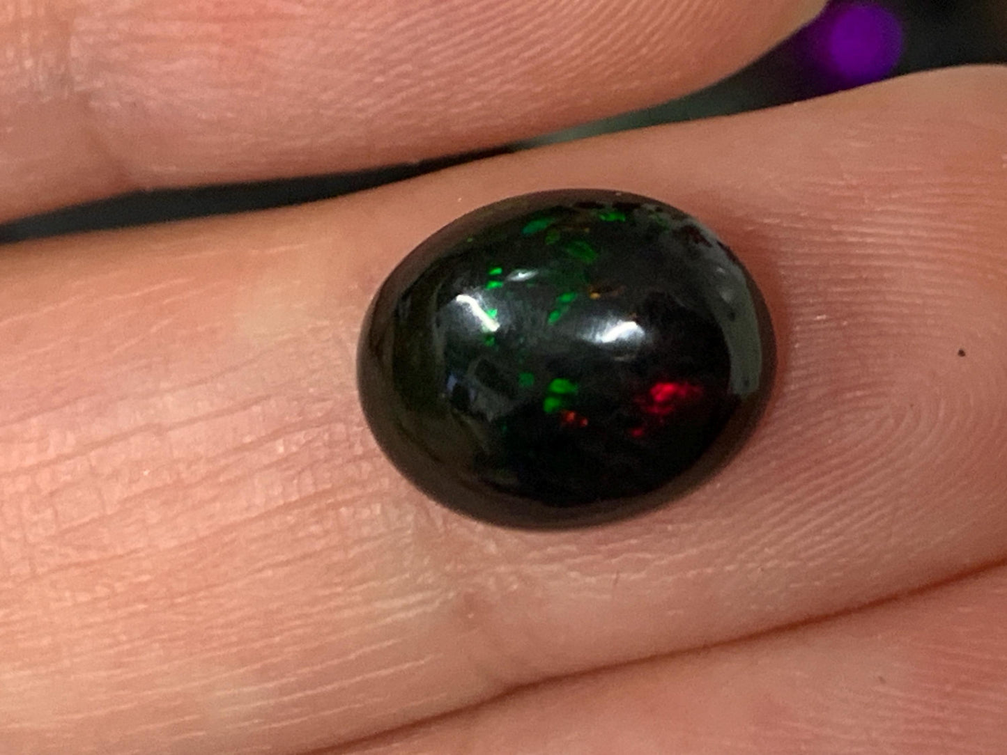 Natural Ethiopian Black Opal 9x12x5mm cabochon