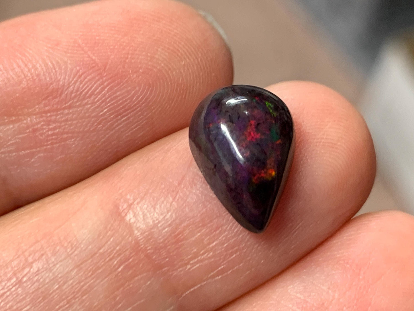 Black Ethiopian Opal pear 9x12x5mm cabochon
