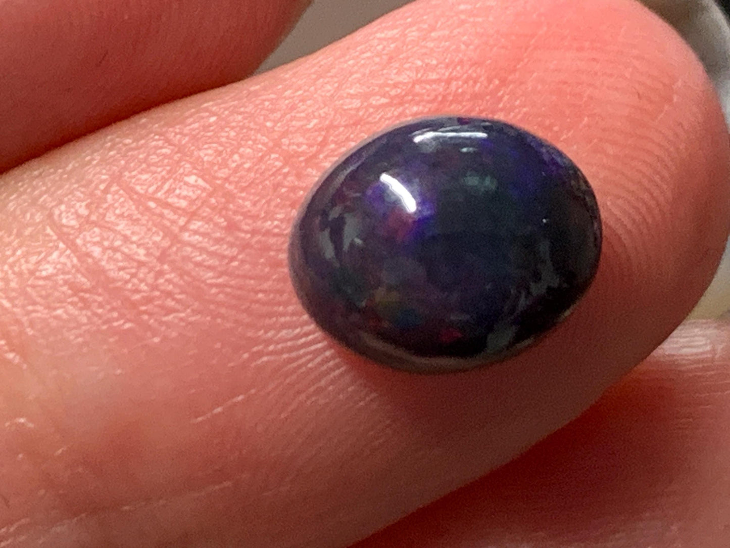 Natural Ethiopian Black Opal 7x9x4mm cabochon