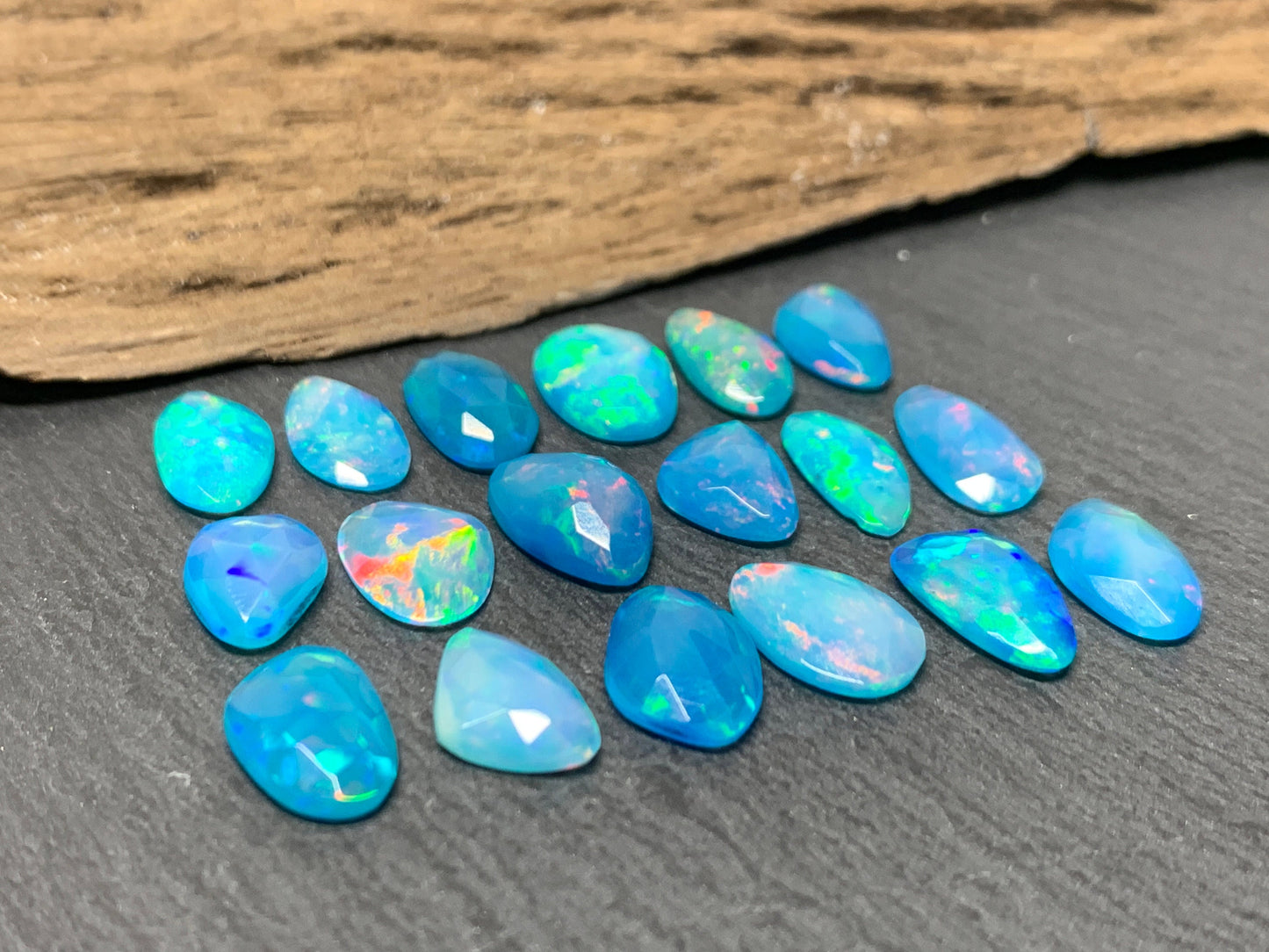 Faceted Blue Ethiopian Opal 11-12mm long cabochon