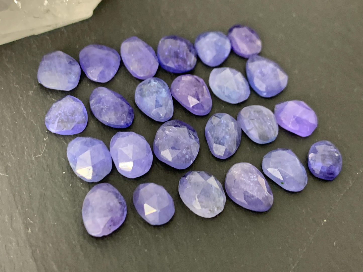 Discounted Damaged Faceted Tanzanite 8-10mm long cabochon