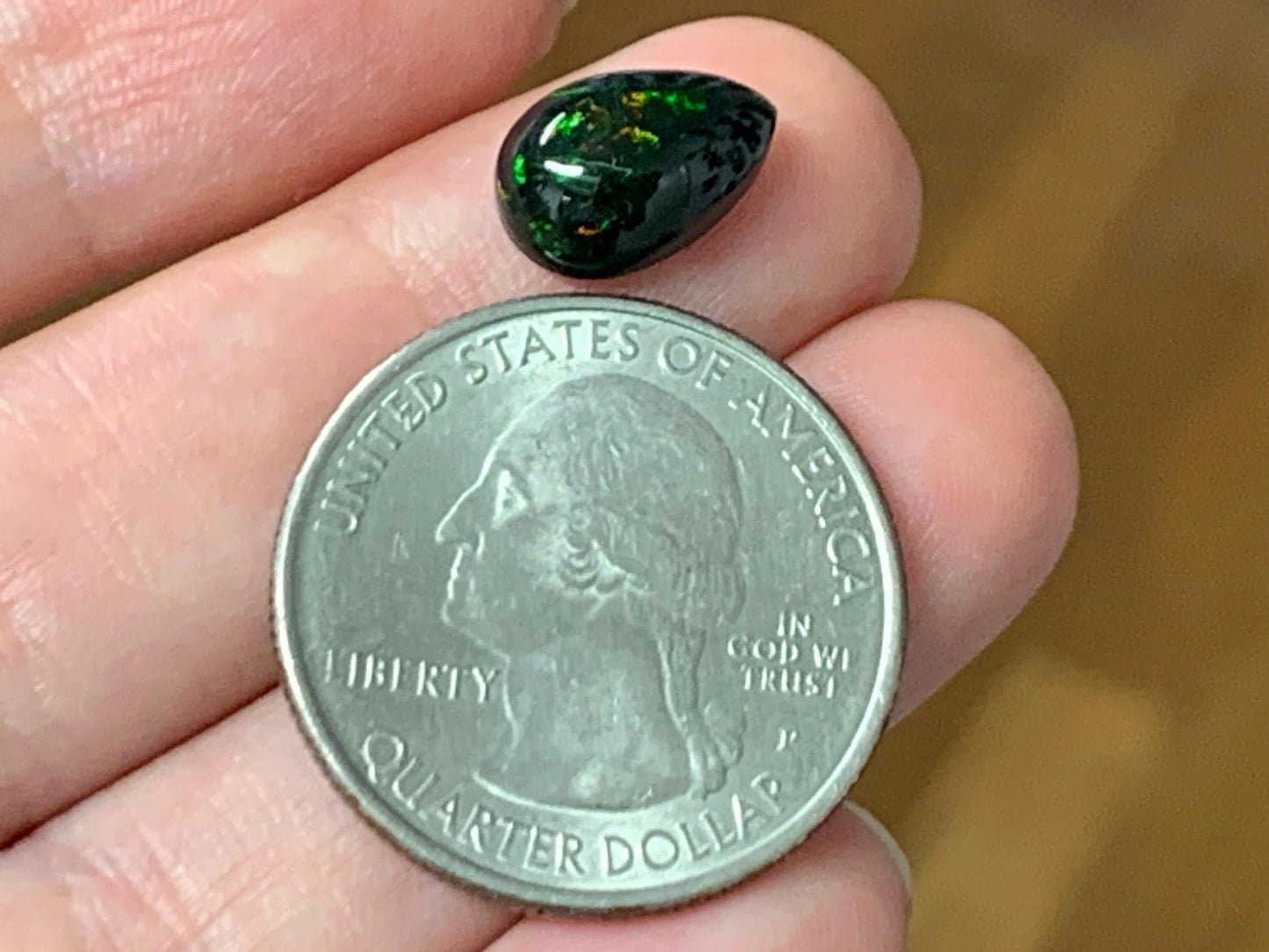 Natural Ethiopian Black Opal 8x12x4mm cabochon