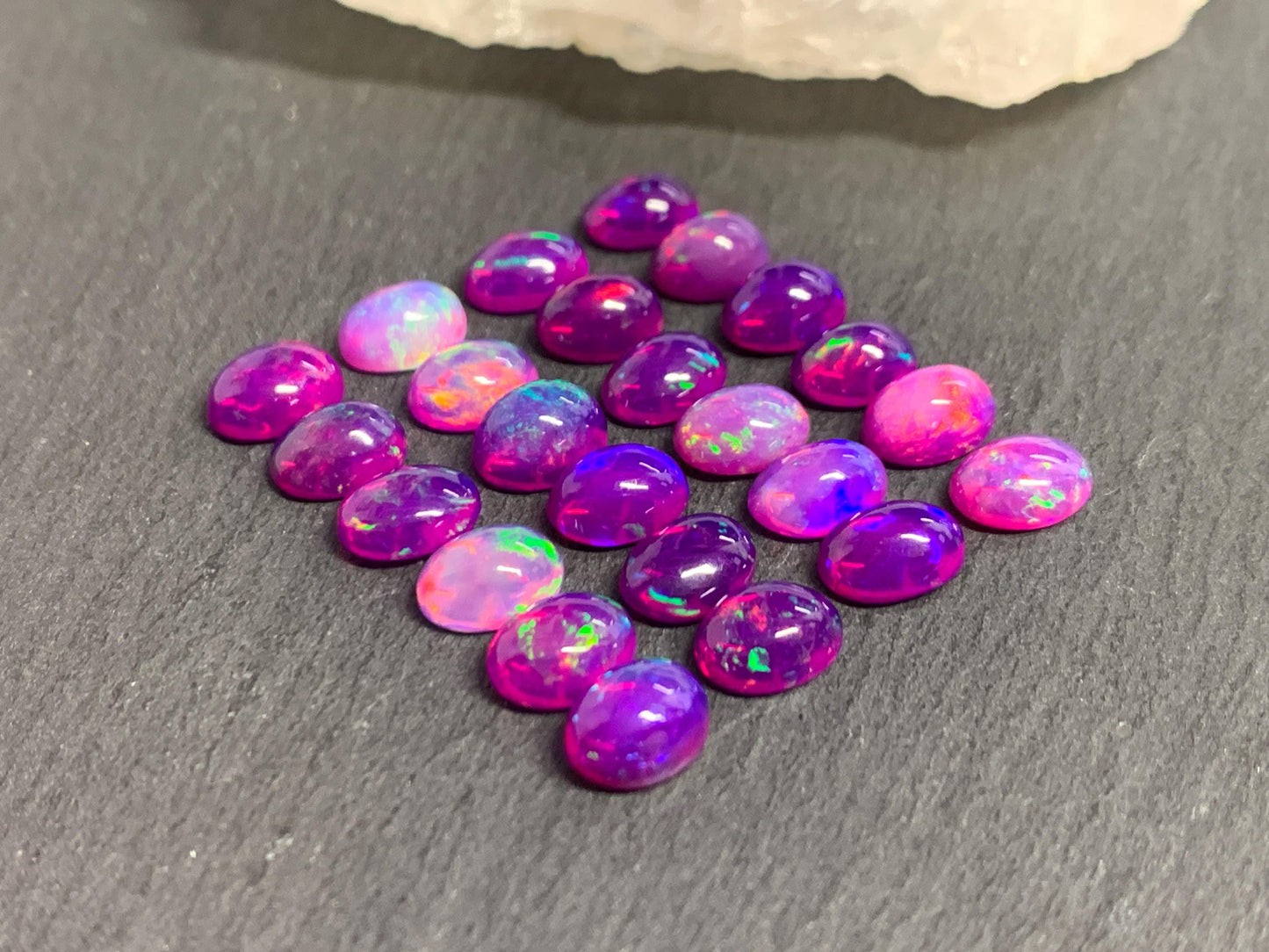 Ethiopian Opal oval 8x10mm cabochon - Natural Opal smoked to purple color