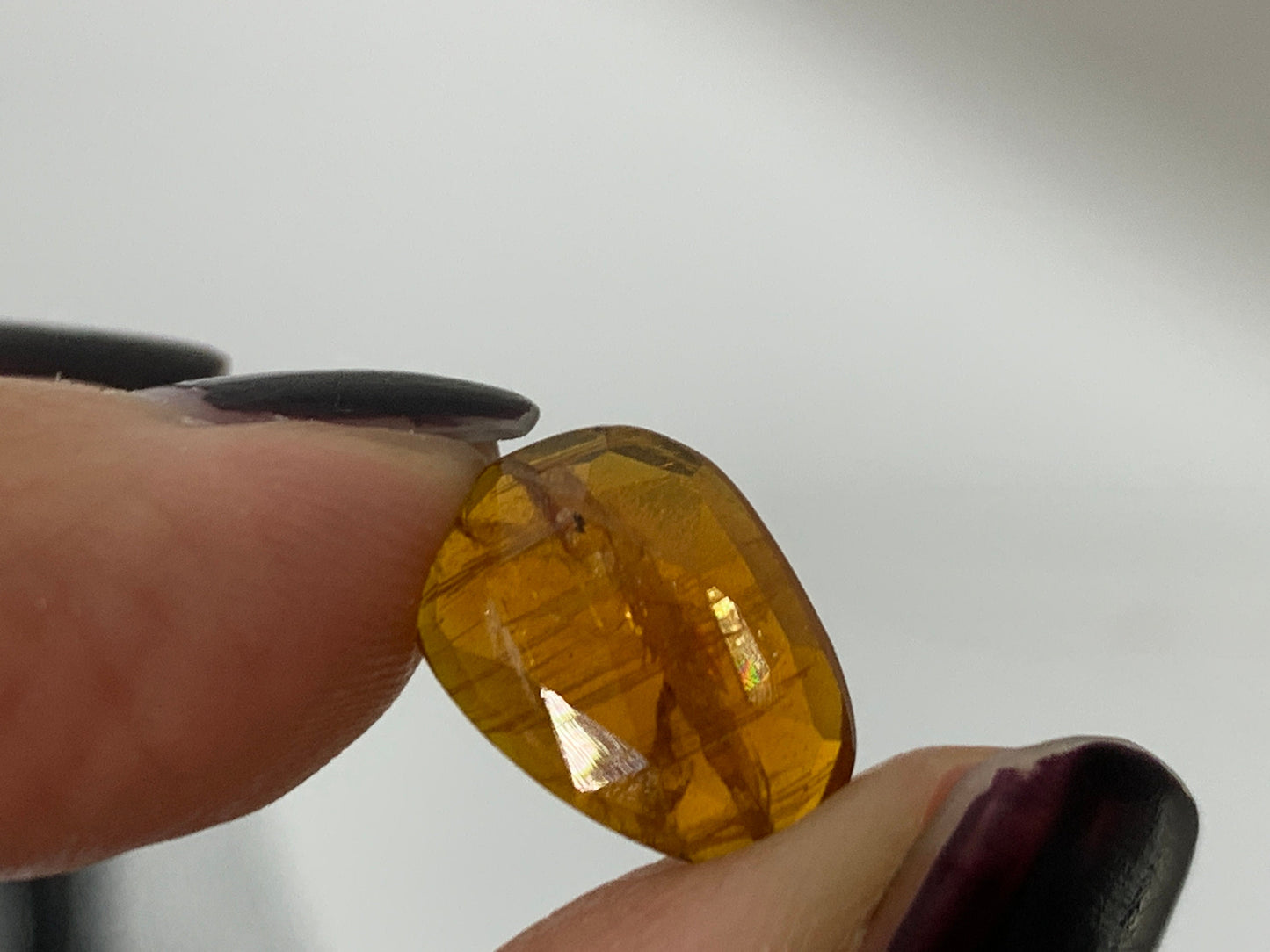 Damaged - faceted orange Kyanite oval 13mm long cabochons