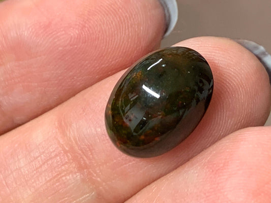Natural Ethiopian Black Opal 10x14x6mm cabochon
