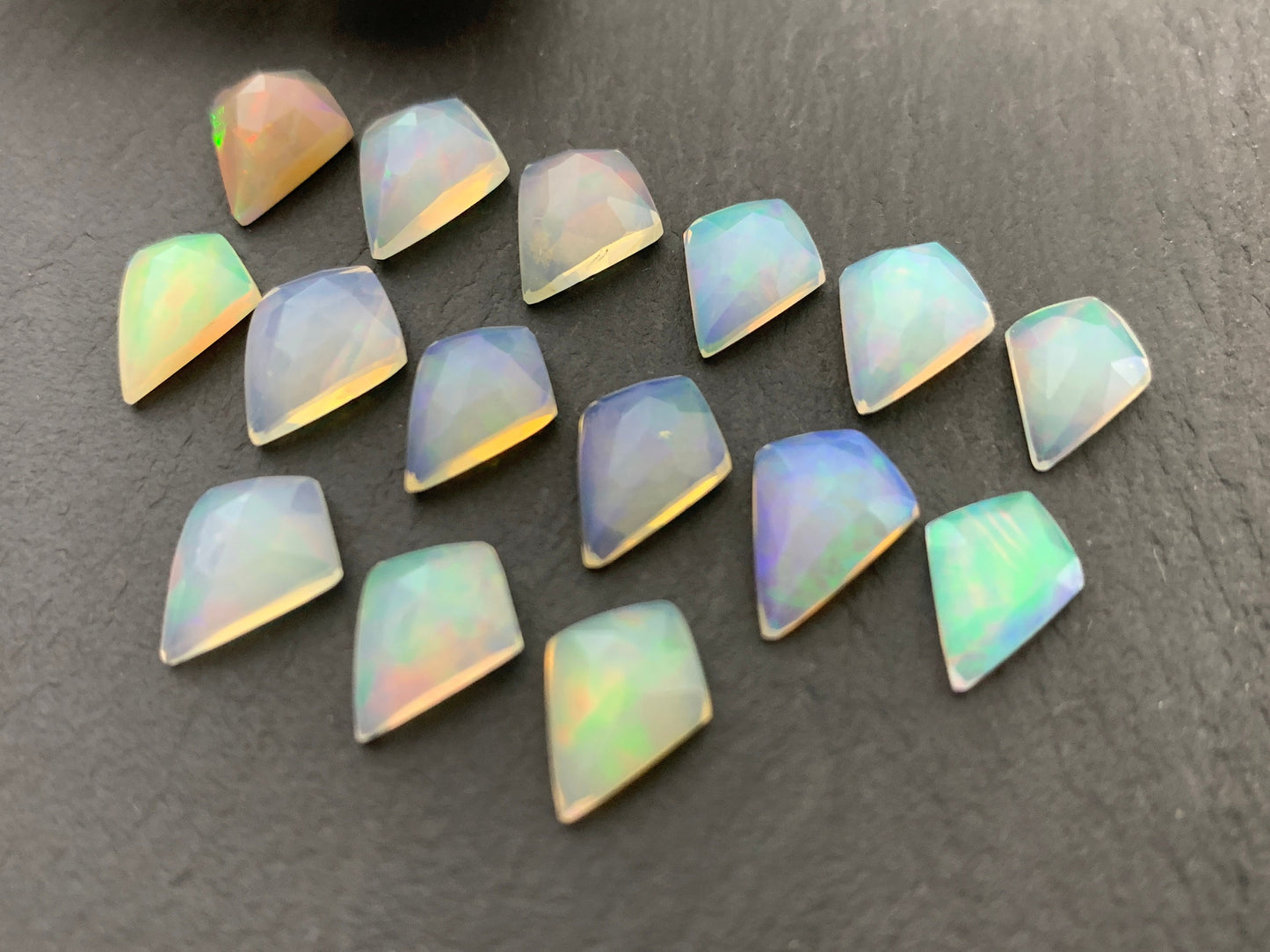 Faceted Welo Opal kite 11-11.8mm cabochon