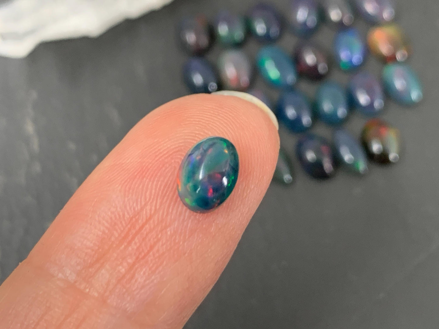 Black Ethiopian Opal oval 5x7mm cabochon