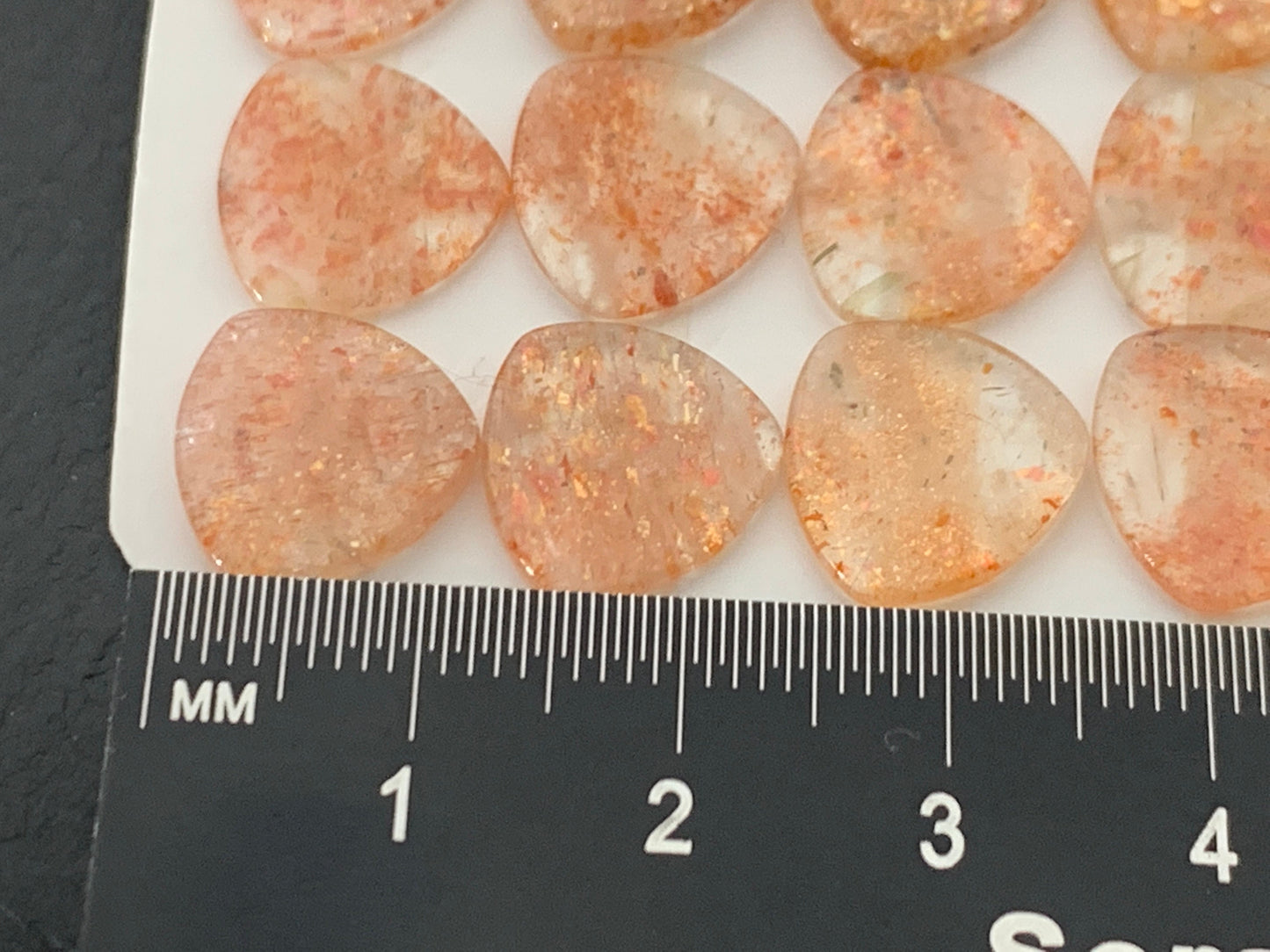 Flat Sunstone curved triangle 12x12mm cabochon - Calibrated cabochons