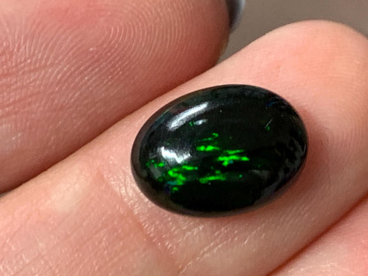 Natural Ethiopian Black Opal 9x12x4mm cabochon