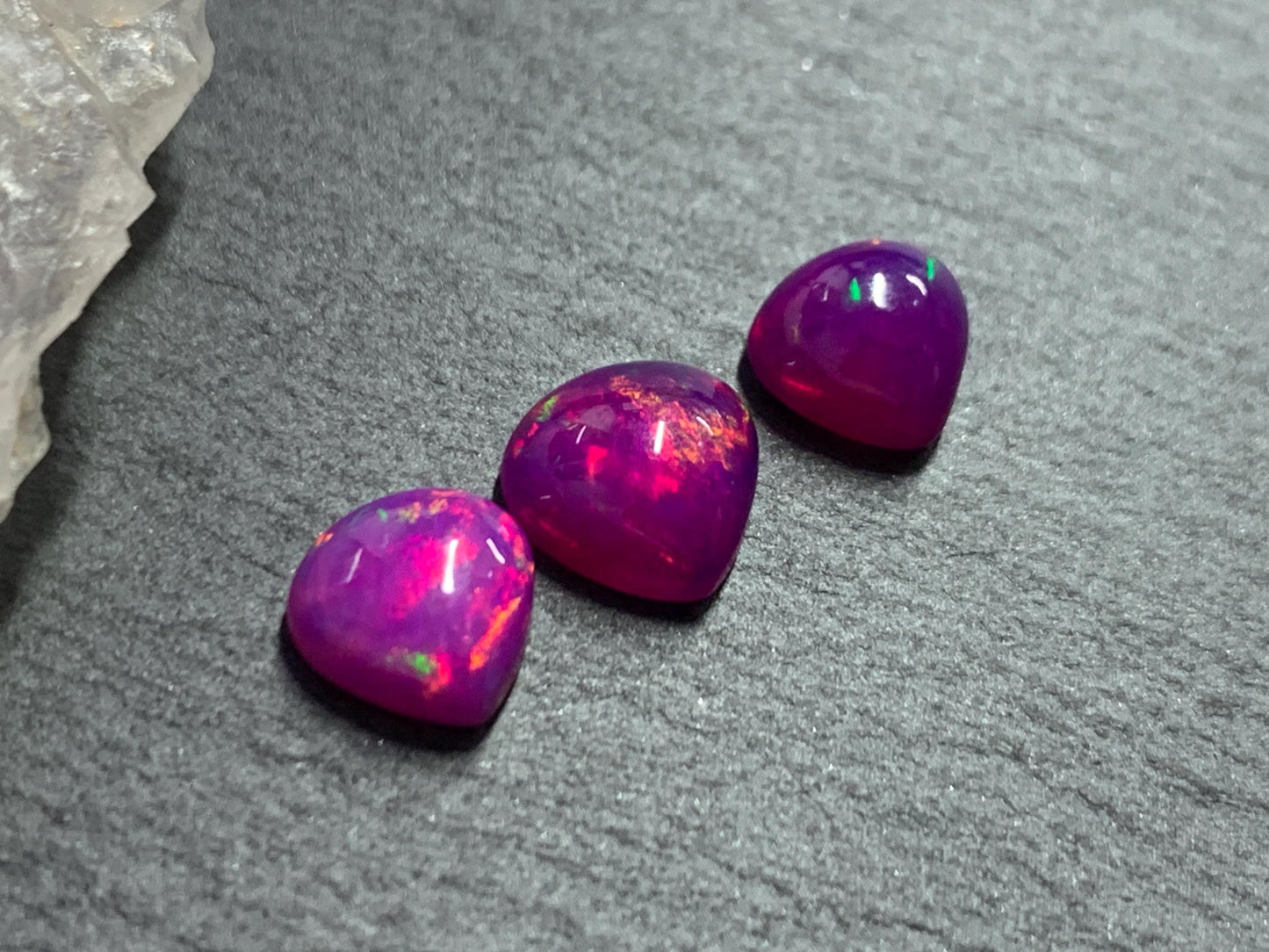 Ethiopian Opal pear 7-8mm long cabochon - Natural Opal smoked to purple color