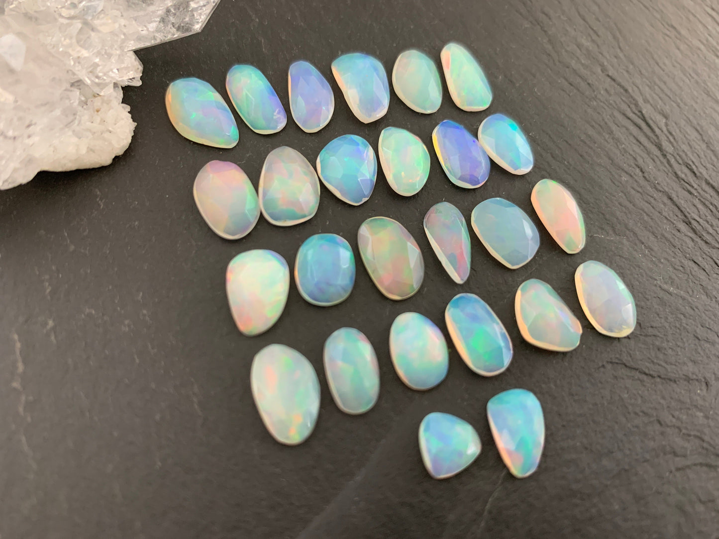 Faceted Ethiopian Opal 9-12mm long cabochon