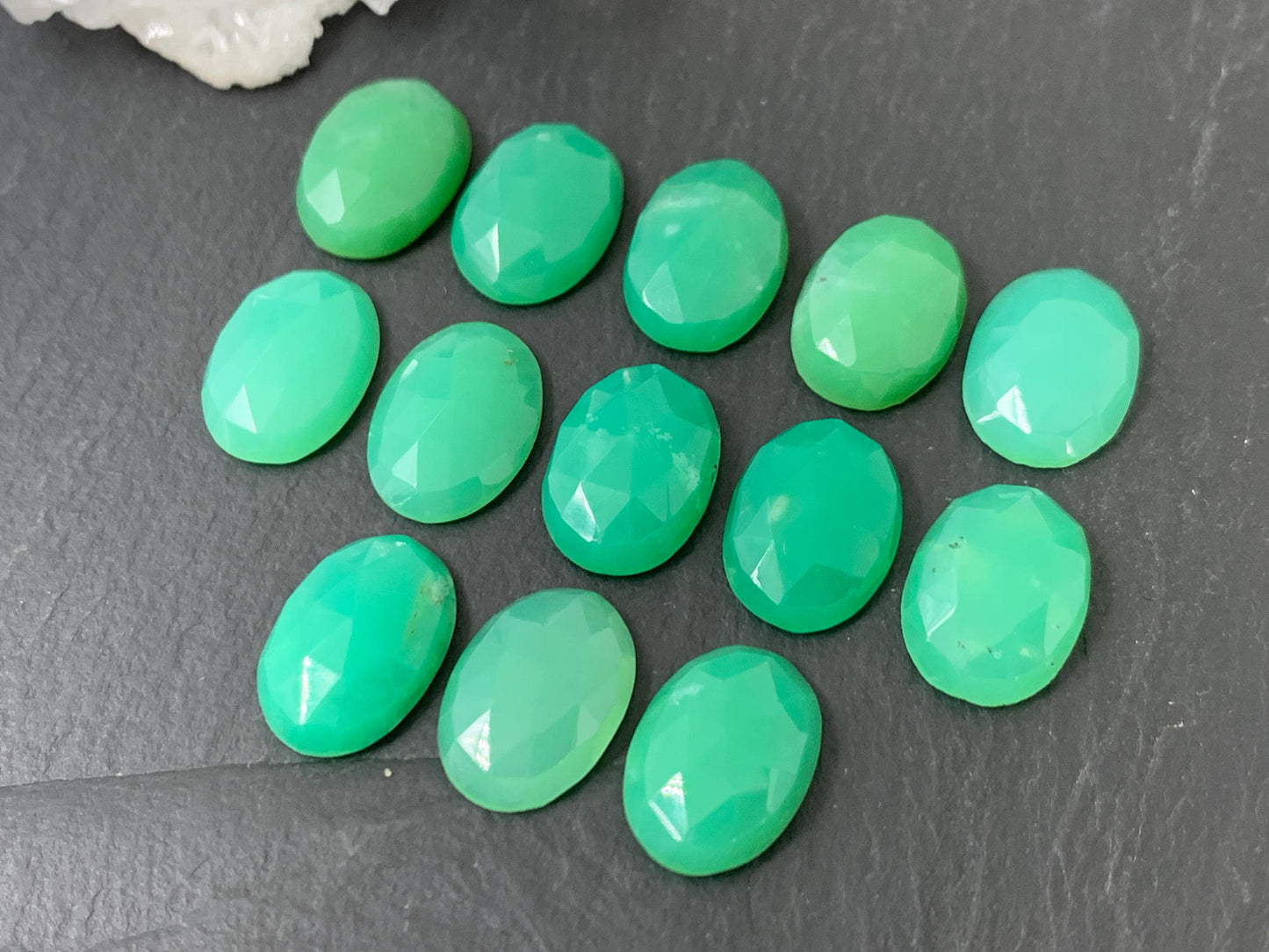 Faceted Chrysoprase oval 10x14mm cabochon