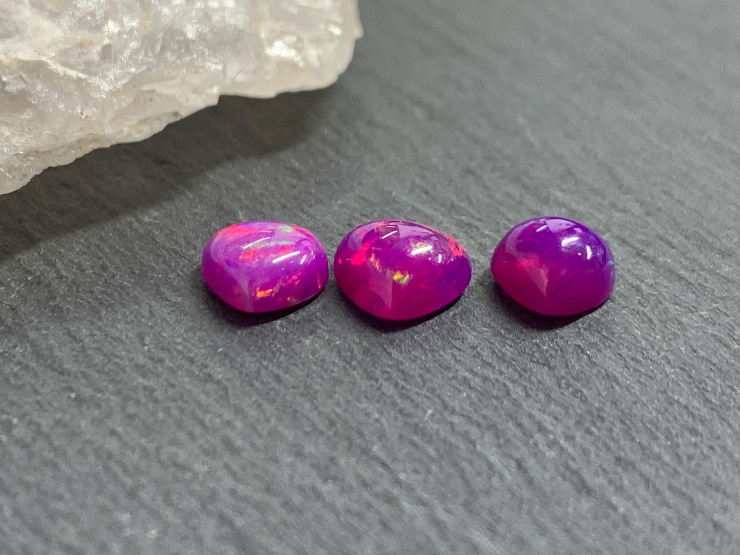 Ethiopian Opal pear 7-8mm long cabochon - Natural Opal smoked to purple color
