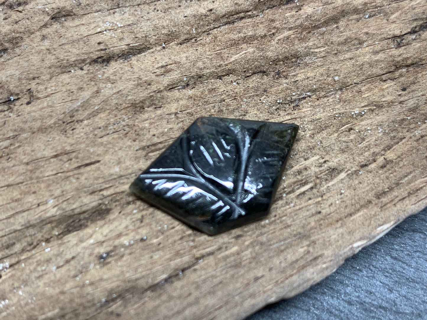 Carved Tourmaline 12x18x2mm cabochon