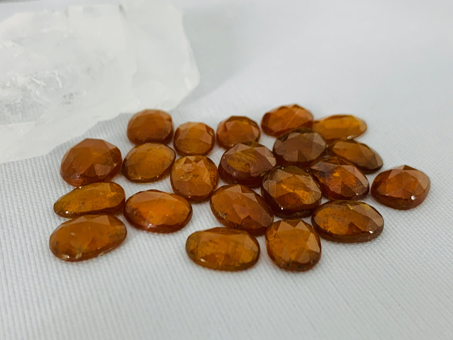 Faceted orange Kyanite oval 7x12mm cabochons