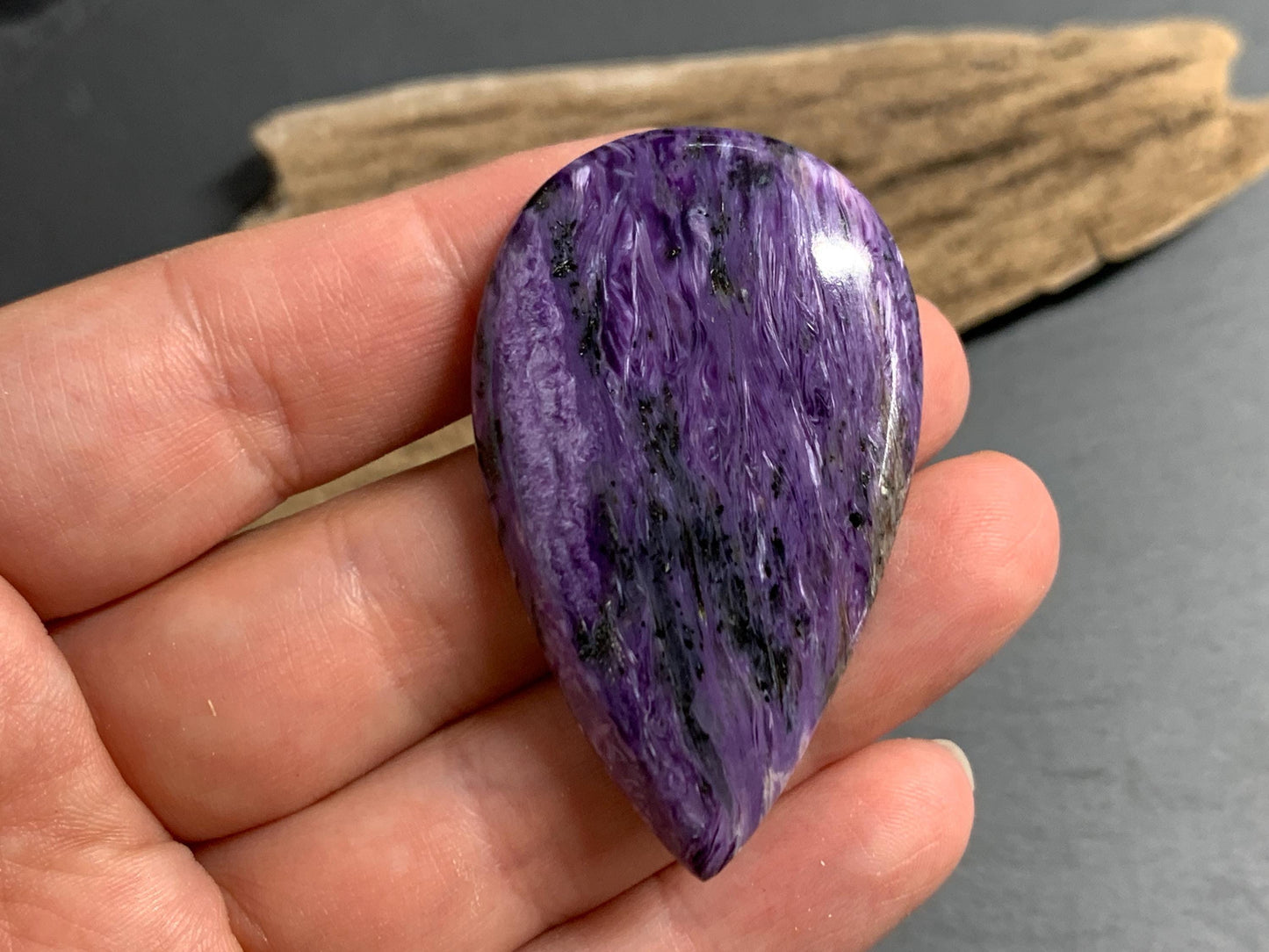 Charoite pear 50x30x7mm cabochon