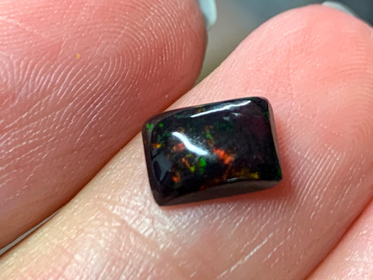 Natural Ethiopian Black Opal 6x8x3mm cabochon