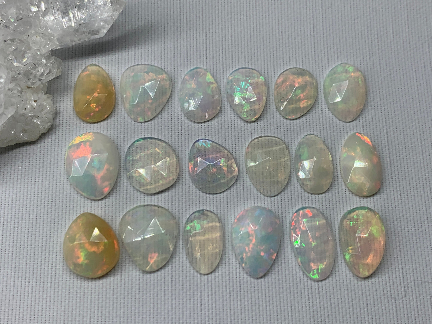 Faceted Ethiopian Opal 10-12mm long cabochon