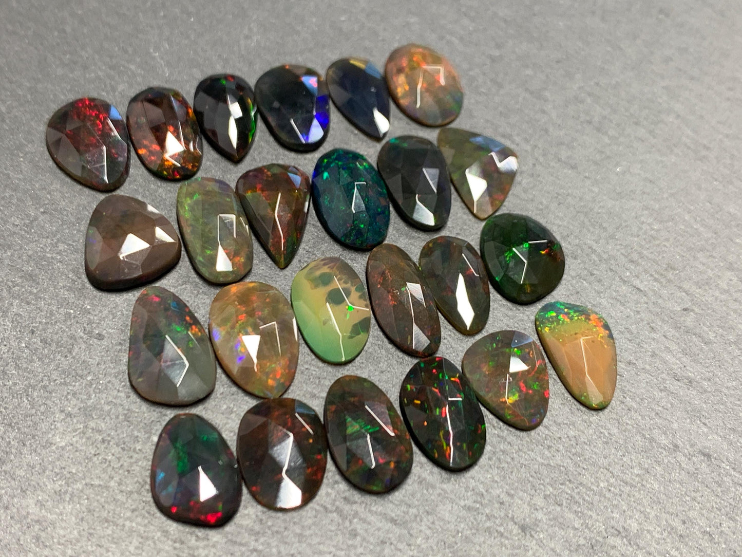 Faceted Black Opal 11-14mm long free form cabochon