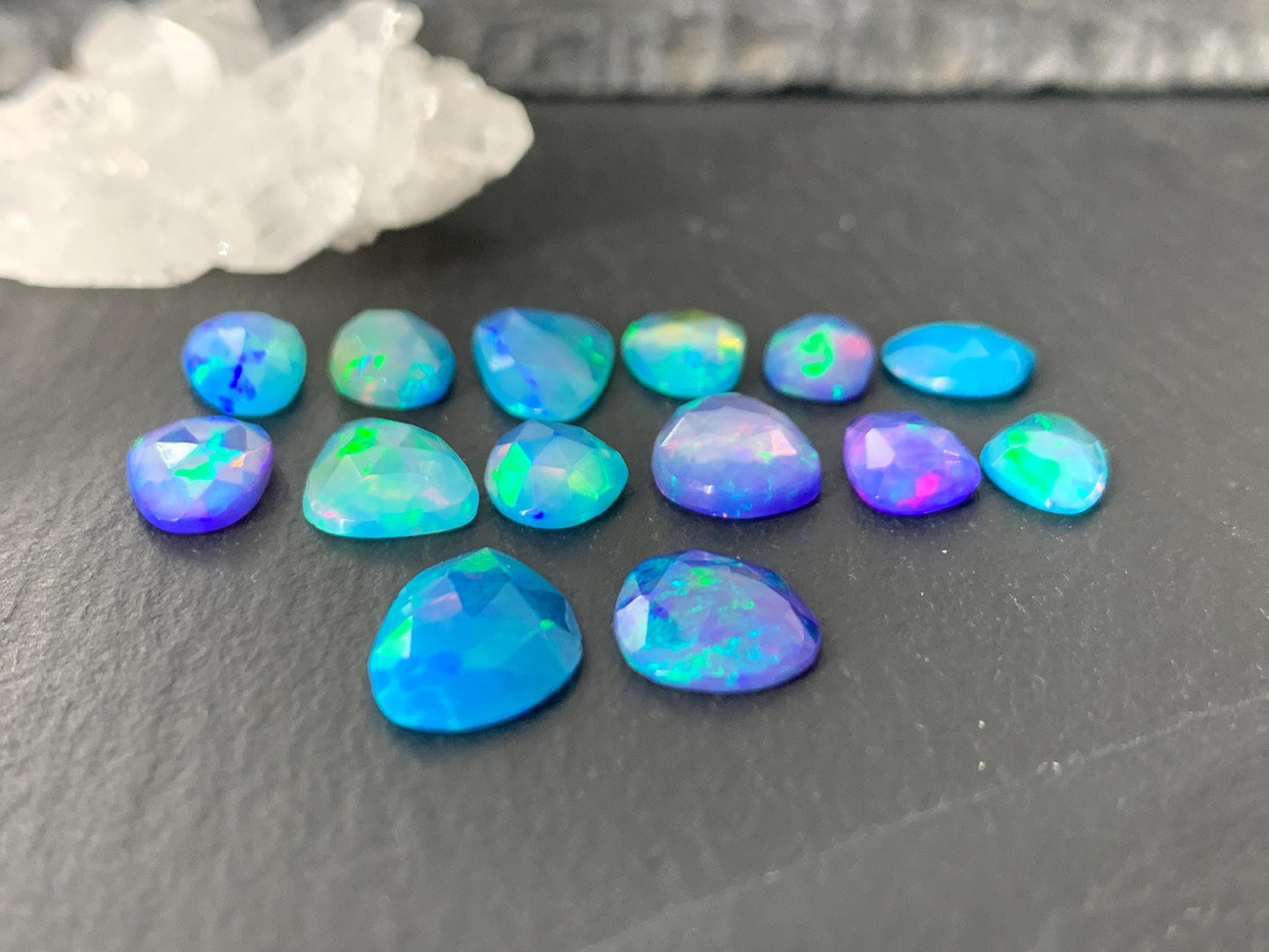 Faceted Blue Ethiopian Opal 8-14mm long cabochon