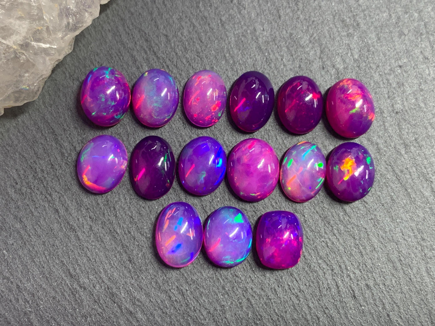 Ethiopian Opal oval 8x10mm cabochon - Natural Opal smoked to purple color