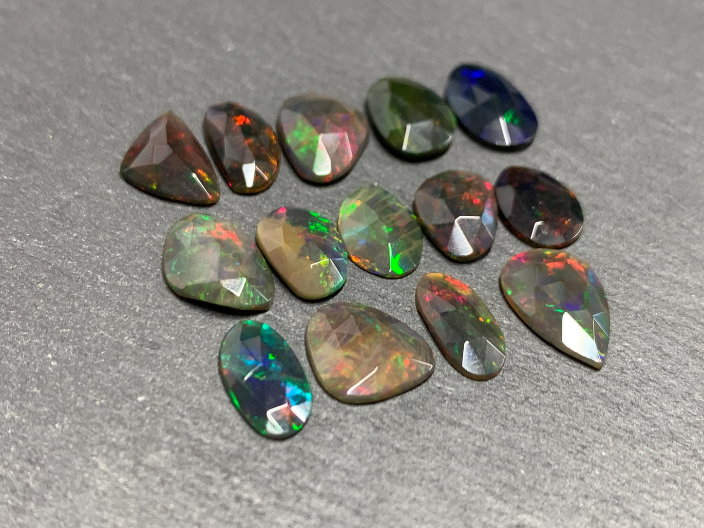 Faceted Black Ethiopian Opal 9-12mm long cabochon