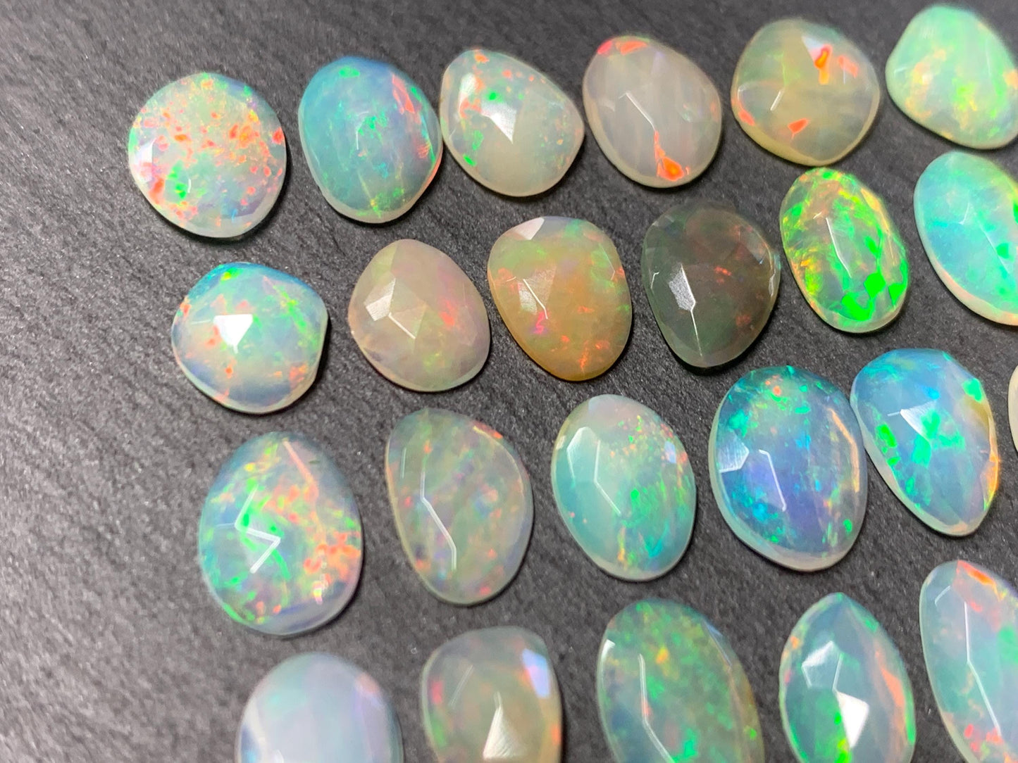 Faceted Ethiopian Opal 9-10mm long cabochon