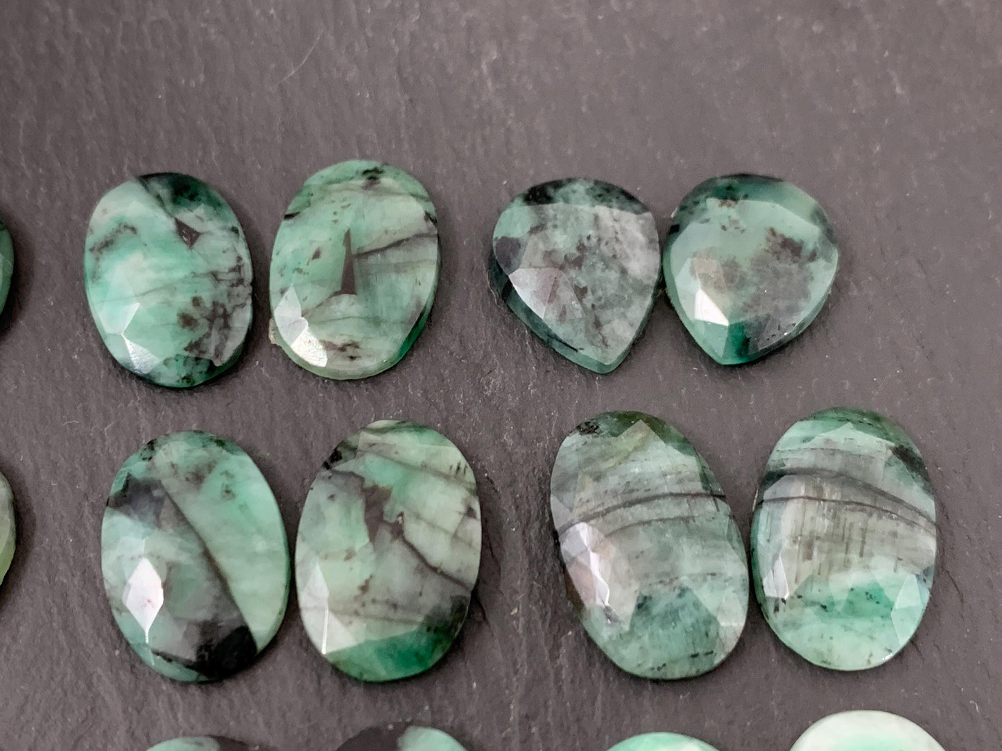 Faceted Emerald pair 14-18mm long cabochon