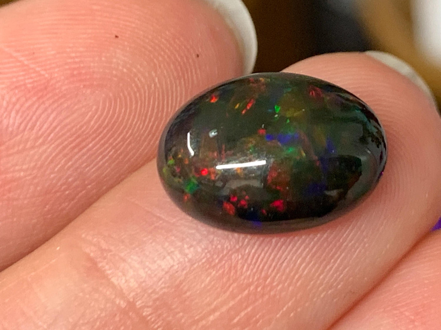 Natural Ethiopian Black Opal 10x13x5mm cabochon