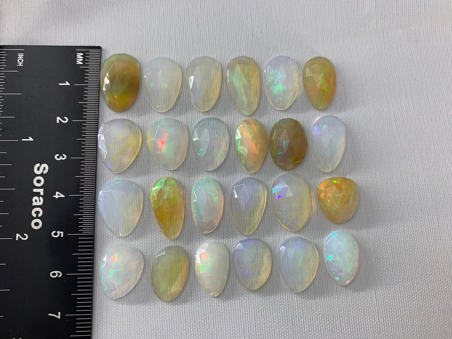 Faceted Ethiopian Opal 14-16mm cabochon