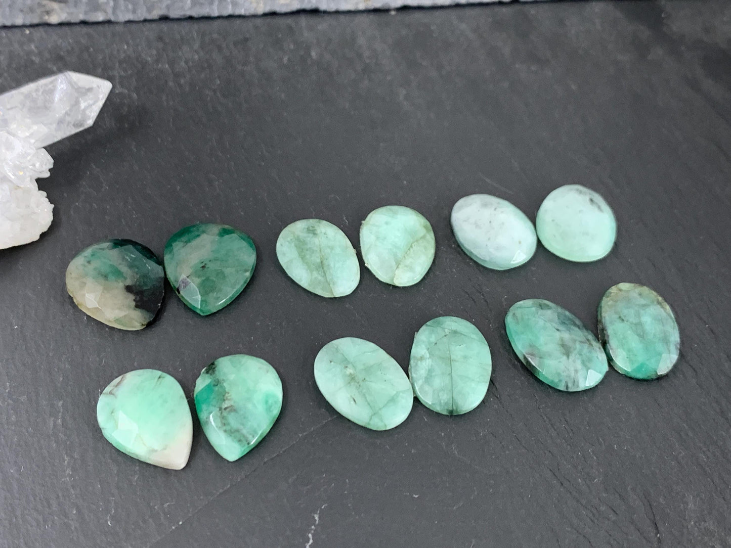 Faceted Emerald pair 15-17mm long cabochon