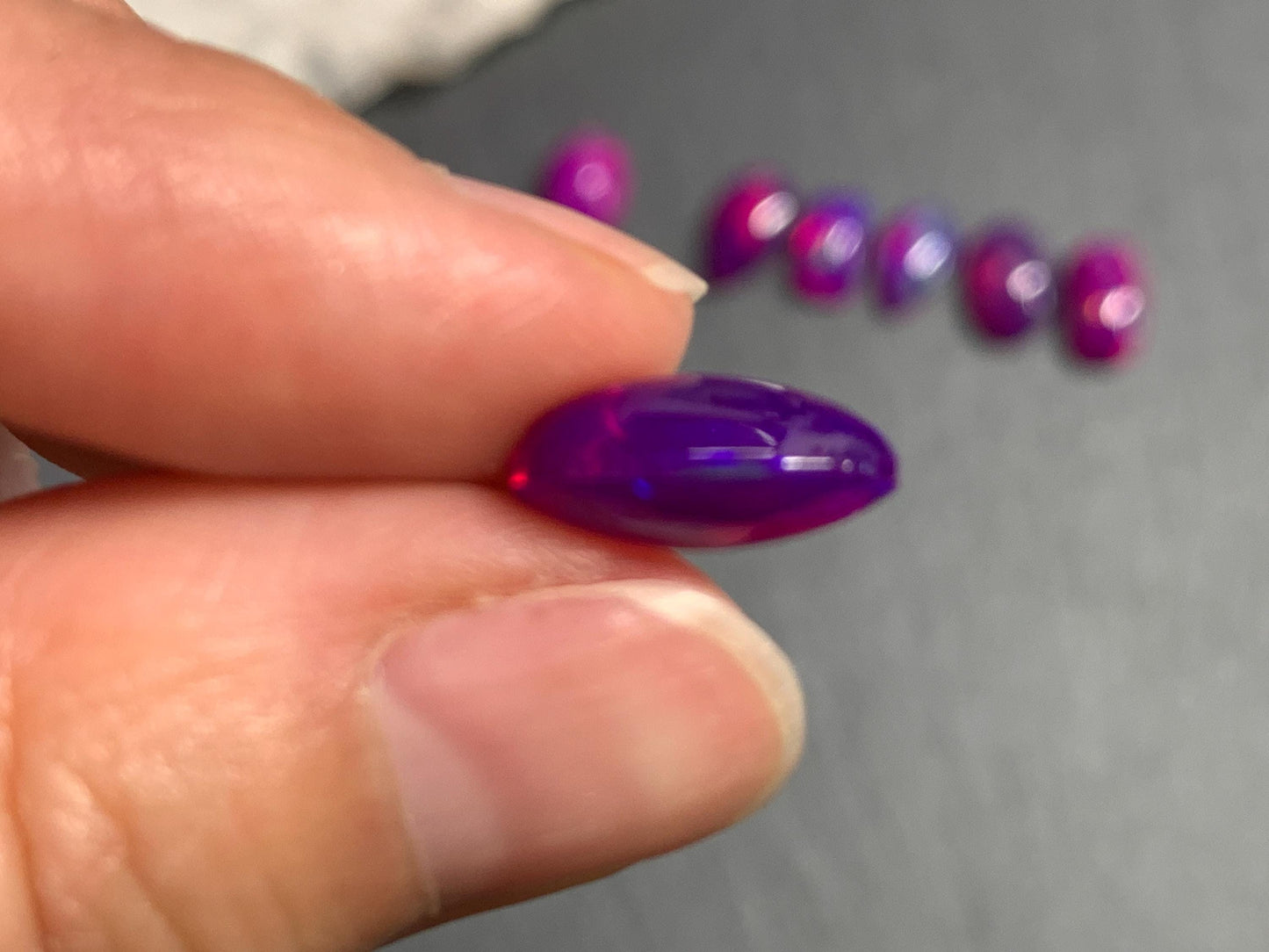 Ethiopian Opal pear 7-8mm long cabochon - Natural Opal smoked to purple color