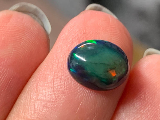 Natural Ethiopian Black Opal 8x10x4mm cabochon