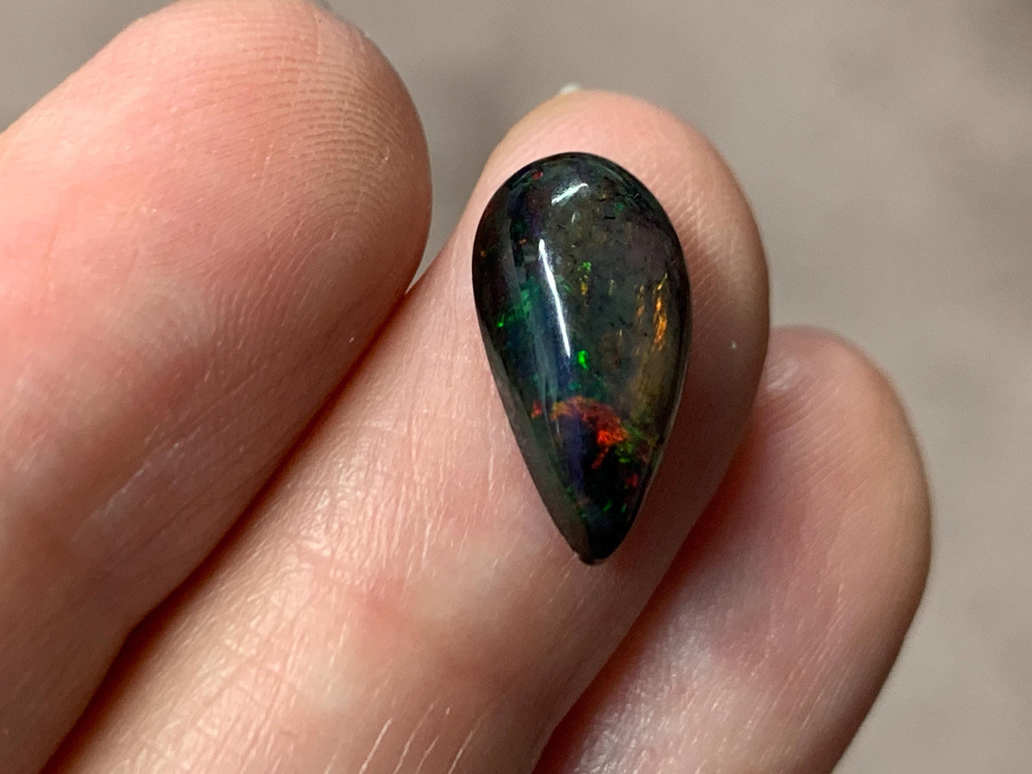 Black Ethiopian Opal pear 7x14x4mm cabochon