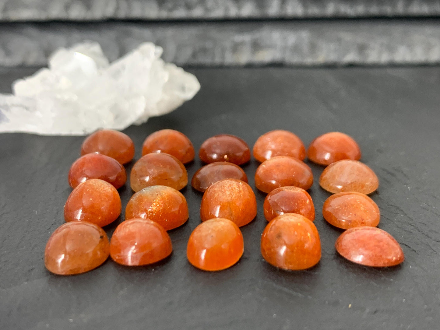 Sunstone round, oval 9-10mm long cabochon