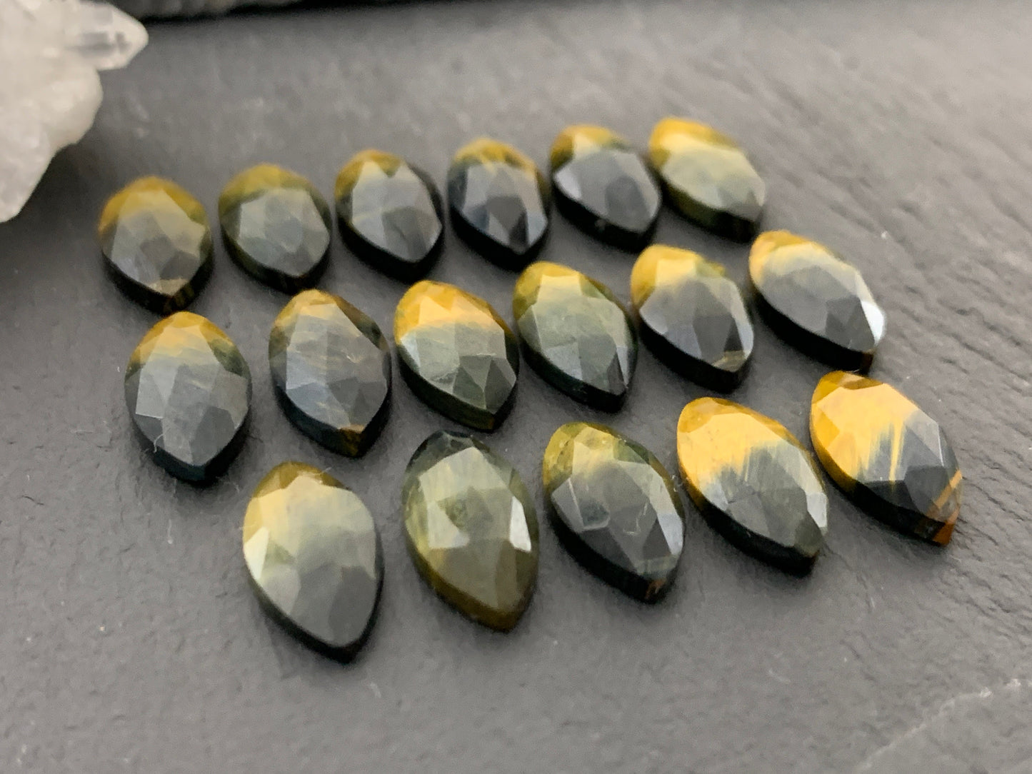 Faceted Yellow Tiger Eye marquise 7x14mm cabochon