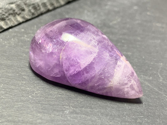 Amethyst pear 34x20x13mm cabochon - free form hand cut in Africa