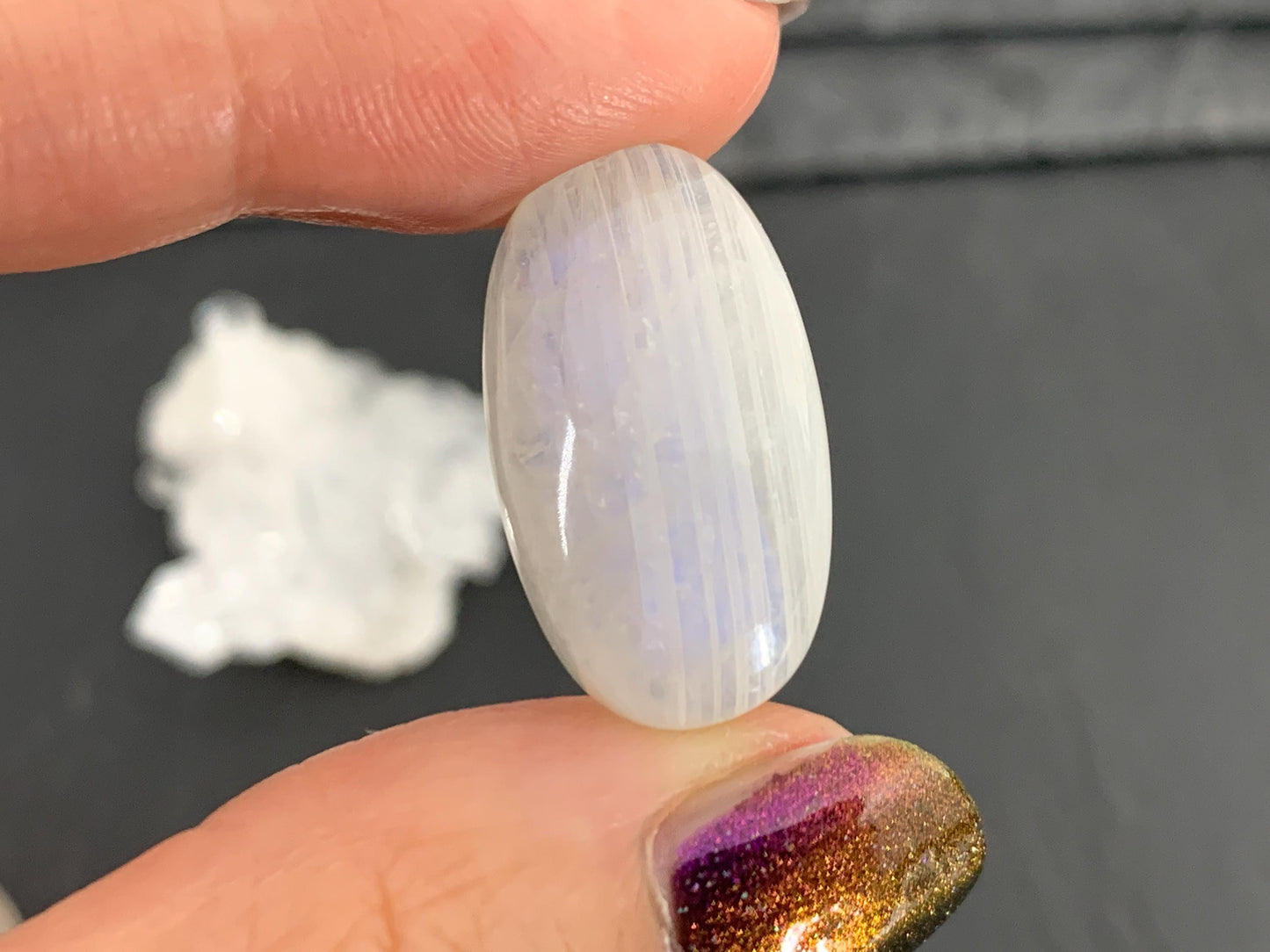 Rainbow Moonstone oval 24x13x8mm cabochon
