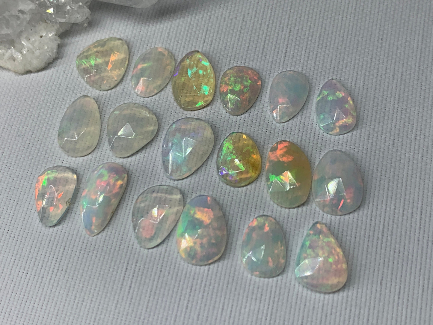 Faceted Ethiopian Opal 8-11mm long cabochon